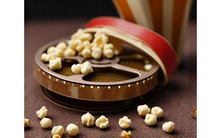 Cinema reel and popcorn